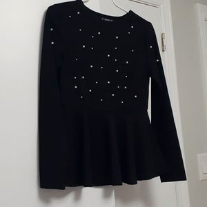 Black peplum shirt with pearl detail